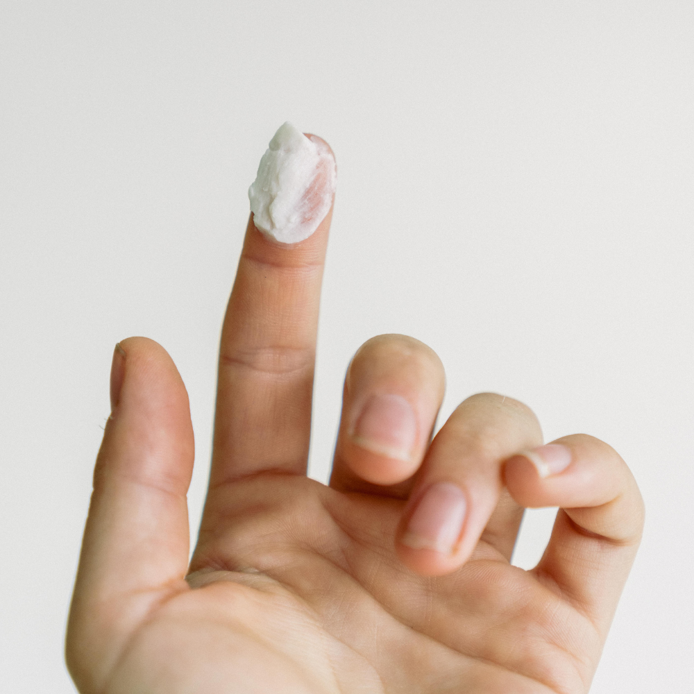 Pomade on fingertip